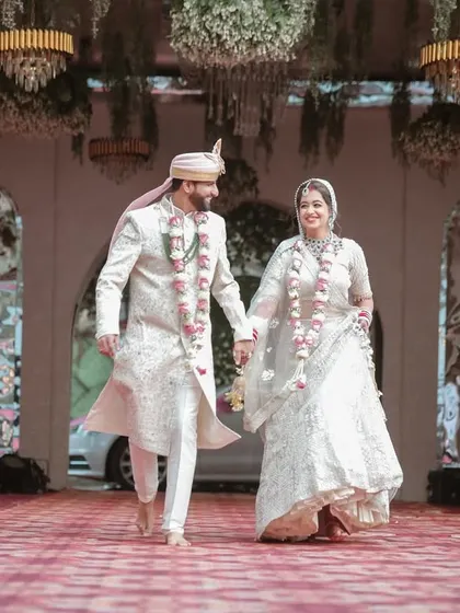 The grand exit, or in this case, the grand entrance as a married couple. We capture the energy and happiness of this moment.