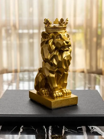A symbol of power and grace, this geometric golden lion with a crown is a must-have for a modern, luxe coffee table. Its sharp lines and bold finish make a strong statement.