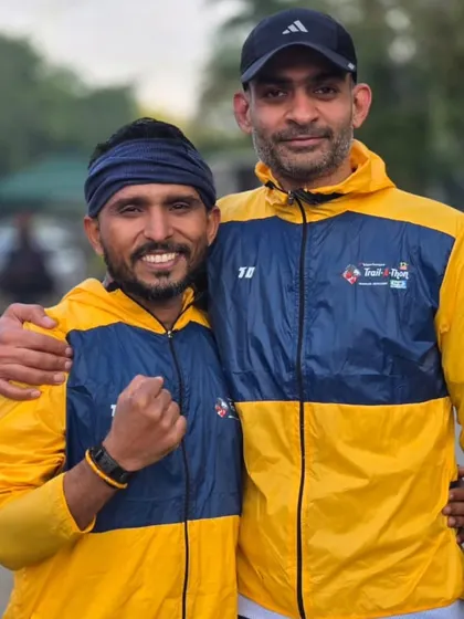 Two of our elite runners, Pradeep and Sidd, after a training run. The bond between coach and athlete is strong.