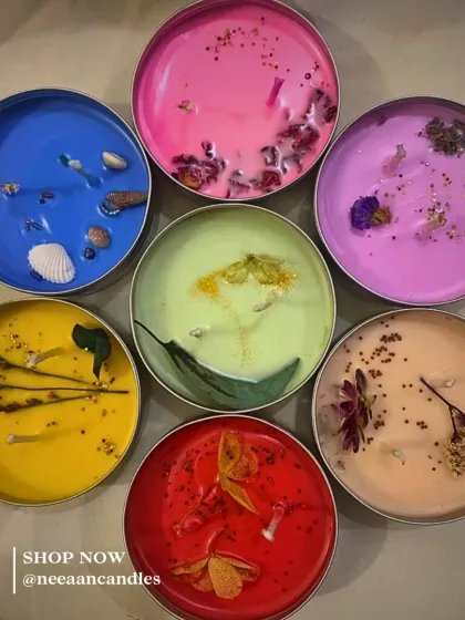 Color your space and calm your soul. This set of 7 Chakra tin candles is hand-poured with love and topped with botanicals to match your mood and balance your energy.