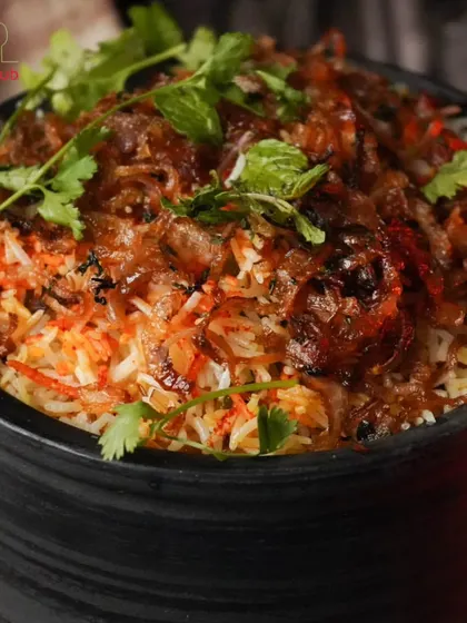 Behold our famous Handi Biryani. This isn't just a dish; it's an experience. We layer fragrant basmati rice with fresh vegetables and aromatic spices, slow-cooking it to perfection to create a healthy version of this classic comfort food.