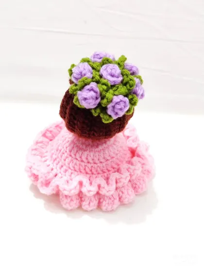 This isn't just a doll, it's a reversible bouquet. I designed this piece to be a beautiful flower doll that flips inside out to become a little bouquet of purple roses. It's one of my most intricate designs and perfect as a unique keychain or gift.