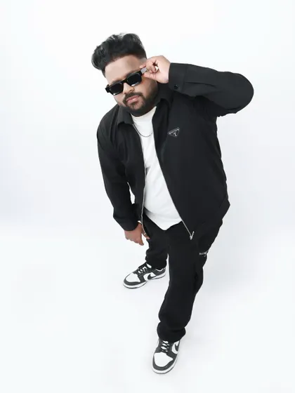 Crafting the right sound starts with the right vibe. This is a shot from one of my studio photoshoots, capturing the energy I pour into every custom music production.
