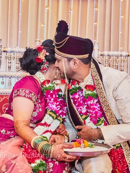 Even in a crowded room, couples find their own private world. I captured this quiet, intimate moment they shared while seated at the mandap.