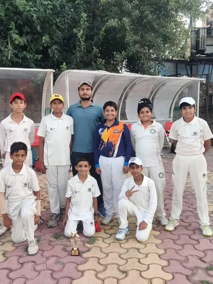 Victory is sweetest when shared. Our Junior Cup U-12 team celebrating together after a hard-fought win in Dwarka. We build not just players, but a supportive team environment.