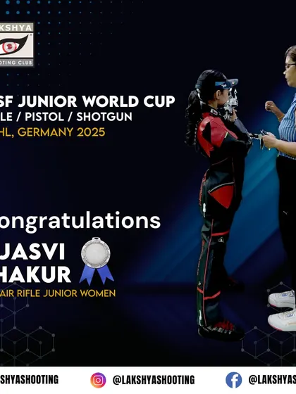 Coach Suma Shirur giving final instructions to Ojasvi Thakur during the ISSF Junior World Cup. This direct mentorship during high pressure events is invaluable.