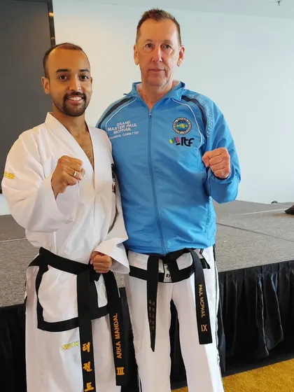 With Grand Master Paul Weiler, President of the ITF. Learning directly from the leadership of our federation is a true honor.