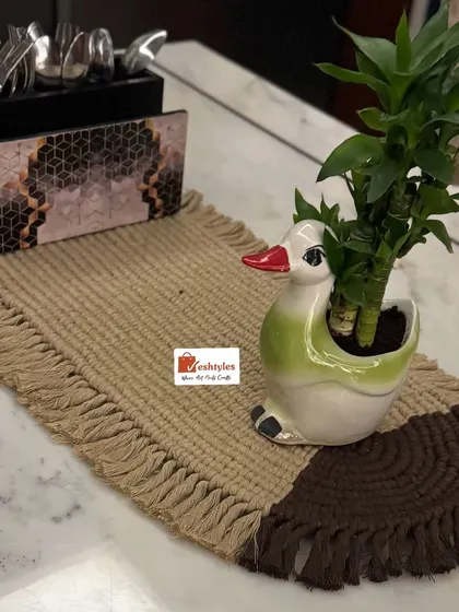 My two-toned table mat, styled on a dining table. It's a beautiful piece of Indian craftsmanship that adds warmth and texture to your home.