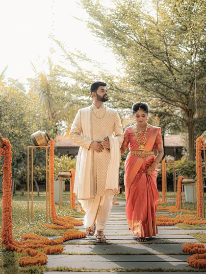 The walk into your future together. I love using the beauty of the venue, like this path of marigolds, to frame your entrance and create a sense of grandeur and destiny.