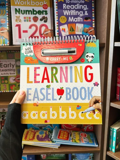 A "Learning Easel Book" for practicing letters. I believe in providing resources that blend play with education.