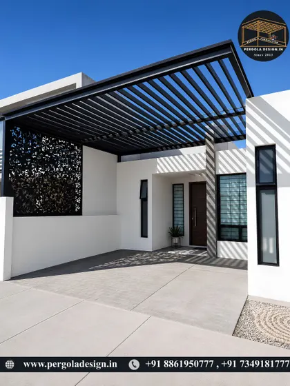 This wide carport pergola provides ample space for multiple vehicles. The design includes a decorative laser-cut screen on one side, adding a touch of elegance and privacy.