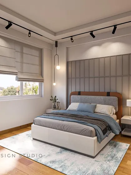 This bedroom concept balances comfort and style with a fully upholstered, channel-tufted headboard that extends across the wall, creating a dramatic and luxurious backdrop for the bed.