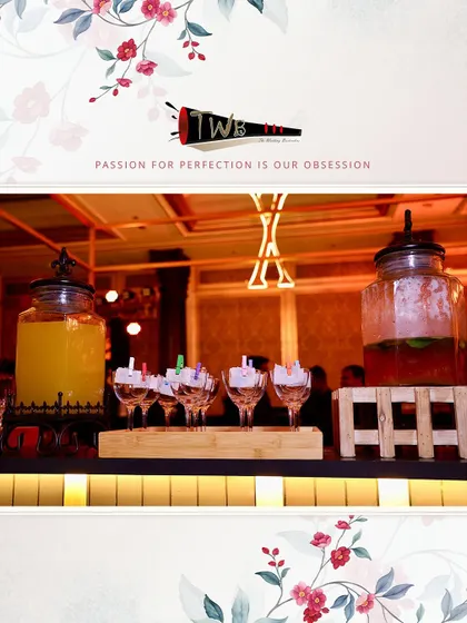 A welcome drink station with infused water dispensers and pre-poured mocktails for guests upon arrival.