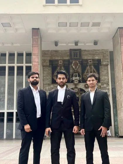 With my colleagues outside a court building, reflecting on a year of hard work. Each year brings new challenges and opportunities for growth in our legal careers.