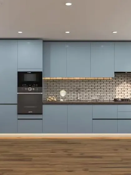 A full-wall straight kitchen in a beautiful shade of blue, complete with an integrated refrigerator and oven tower. The brick-patterned backsplash adds a rustic, industrial texture to the space.