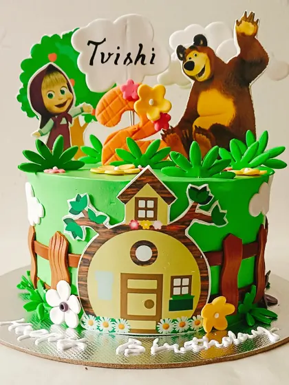 A charming Masha and the Bear cake, bringing the beloved cartoon characters to life for a second birthday.