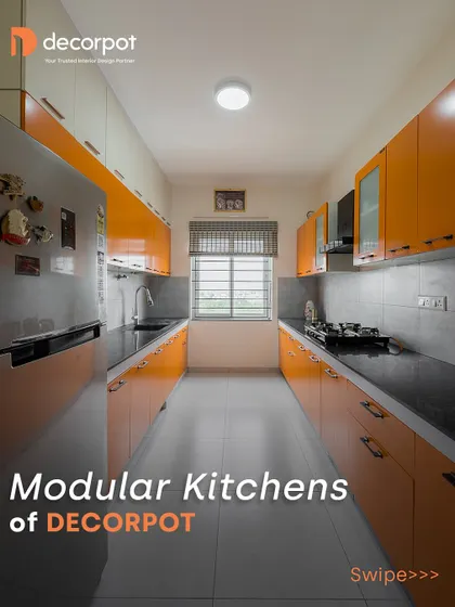 This parallel kitchen in a vibrant orange is designed for maximum efficiency. With countertops and cabinets running along two opposite walls, this layout is perfect for a galley-style space, ensuring everything is within arm's reach.