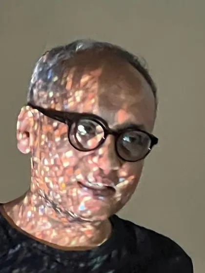 A portrait taken during a design charette, with the urban fabric projected onto my face. It speaks to how the city gets under your skin when you take on the responsibility of making architecture within it.