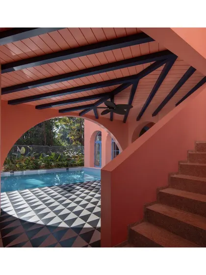 The veranda is a classic architectural element, and at Baia Villas, I reinterpreted it with a modern sensibility. The space is bathed in a warm pink glow, with light and shadow creating a poetic, ever-changing canvas that connects the indoors with the outdoors.