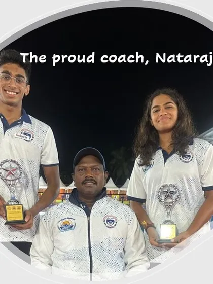 The proud coach, Nataraj V, with his champion swimmers Aneesh and Hashika.