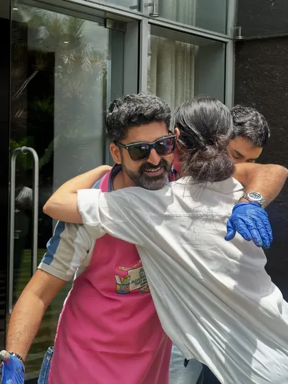 A candid moment from a fluid art birthday party. We love seeing the joy and connection as families create together.