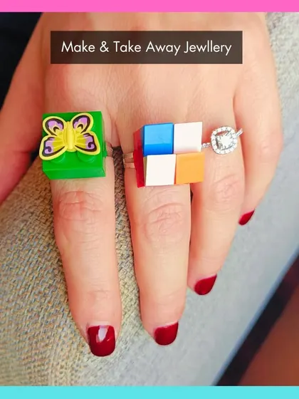 Students get to make and take away their own jewelry, like these creative and colorful rings.