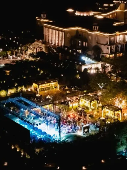 An aerial view of a magnificent welcome dinner we orchestrated at Raffles, Udaipur. This perspective showcases our ability to manage grand-scale productions, transforming sprawling venues into intimate, beautifully lit spaces for celebration.