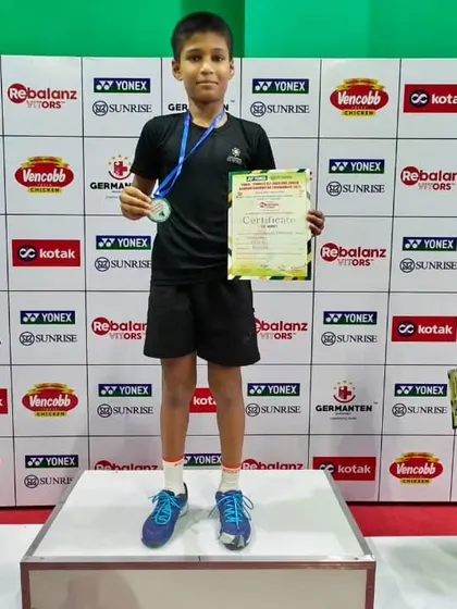 Standing proud on the podium, Mayuresh after a hard-fought tournament at the Kotak Pullela Gopichand Badminton Academy.