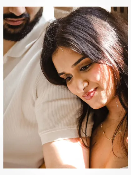 A tender portrait from a Goa pre-wedding shoot, focusing on the couple's affectionate bond.