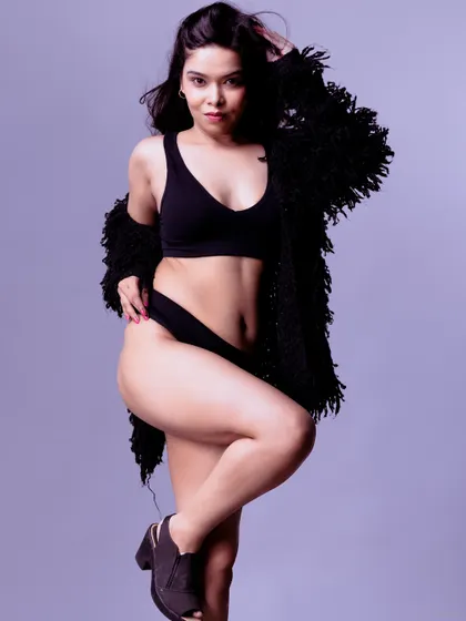 A color-toned version of the same pose, adding a unique artistic flair.