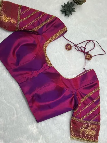 When magenta meets masterful embroidery, the result is couture alchemy.
