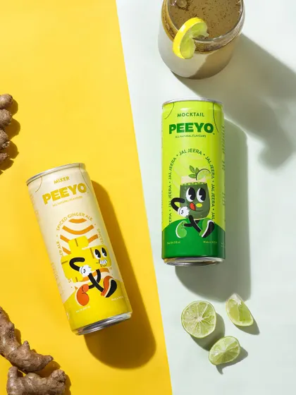 A colorful flatlay showcasing two different flavors of the mocktail brand. I used the core ingredients, ginger and lime, as props to clearly communicate the flavors in a visually appealing composition.