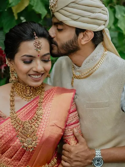 A gentle moment of affection against a backdrop of lush greenery. We love creating these serene and intimate couple portraits that you will cherish for a lifetime.
