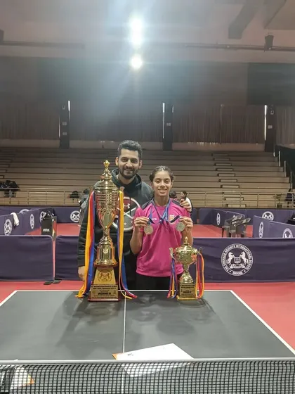 Another shot of me with Ananya at the SGFI games, a moment of shared pride and accomplishment. This reflects the close bond and teamwork between our coaches and players.