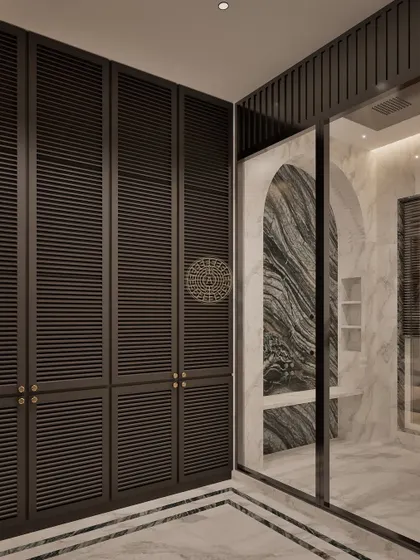 This render shows a dressing area with dark, louvered wardrobe doors. The adjoining bathroom features a stunning arched marble detail in the shower, creating a seamless and luxurious suite.