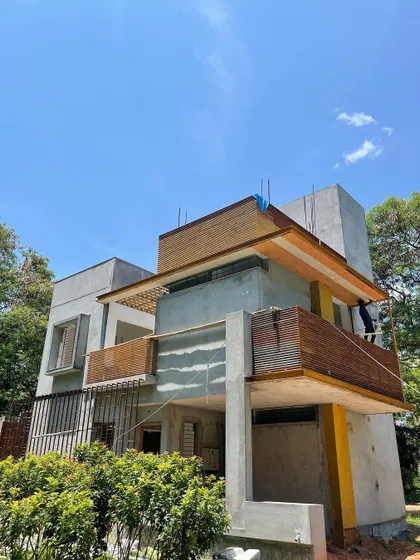 Another view of the house from the park, showing its contemporary form.