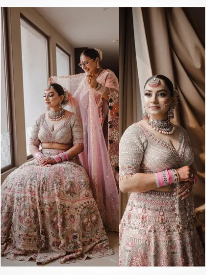 A touching moment between the bride and her mother getting ready for the wedding ceremony.