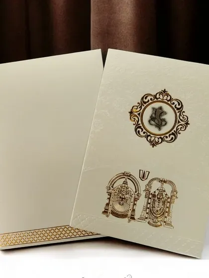 A classic wedding invitation featuring the divine grace of Lord Balaji and an auspicious Ganesha motif for a blessed start.
