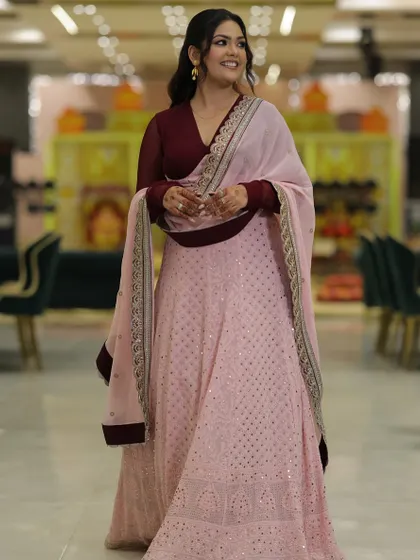 A smiling portrait in my engagement outfit. The side-swept hair and statement earrings complete the look without being overpowering.