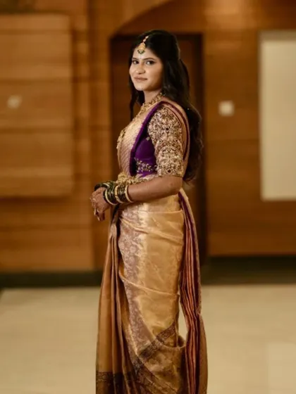 The full look of Deepika's bridal saree, showcasing its rich texture and beautiful drape.