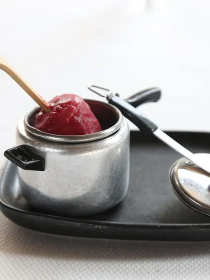 Another view of our signature sorbet, a refreshing palate cleanser that prepares you for the next course in your culinary journey.