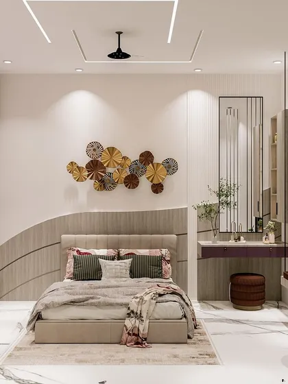The complete bedroom design, where soft curves, a gentle color palette, and metallic art create a chic and feminine space.