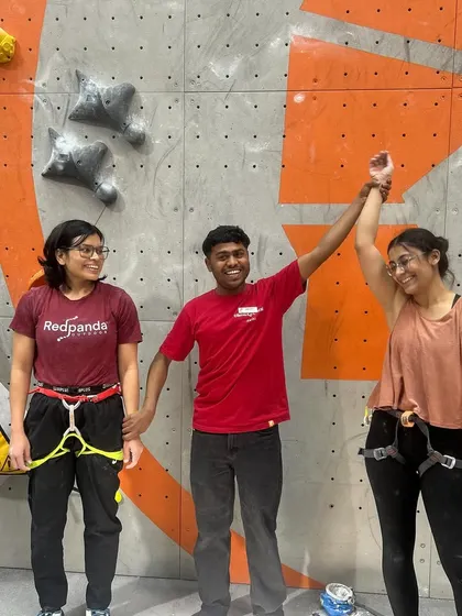 The top two female competitors share a moment of sportsmanship after a hard-fought Speed Climbing final.