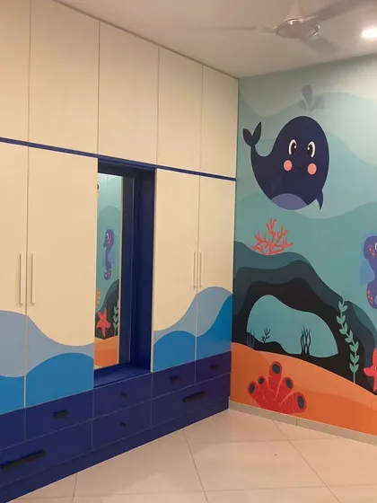 Closets are making waves, and this sea wall is the real show-stealer! A fun, custom-designed wardrobe for a child's room with an underwater theme.