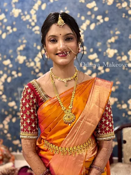 A full portrait of a stunning South Indian bride. I provide complete styling, including saree draping, to ensure the final look is exactly as you've dreamed, from head to toe.