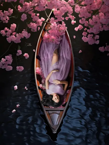A truly magical maternity portrait for this mom-to-be, floating in a boat surrounded by beautiful lavender blossoms. This artistic concept shoot is perfect for creating a one-of-a-kind memory of your pregnancy journey.