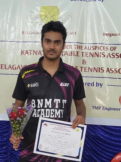 Shreyal Telang with his certificate after finishing as the runner-up in the men's singles at the Belgaum state ranking tournament.