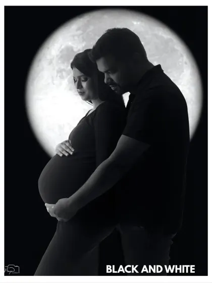 Sometimes, stripping away color reveals the most powerful emotions. My black and white portraits focus on the raw connection, the beautiful silhouette of your bump, and the profound love story unfolding in the quiet moments.