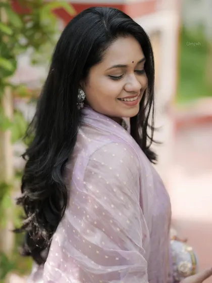 A candid shot of me in a simple and elegant lavender salwar suit.