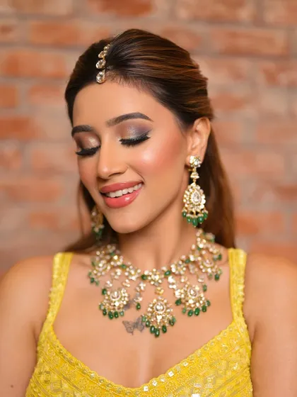A smiling, happy shot that shows how beautiful and wearable a smokey eye can be for daytime events.